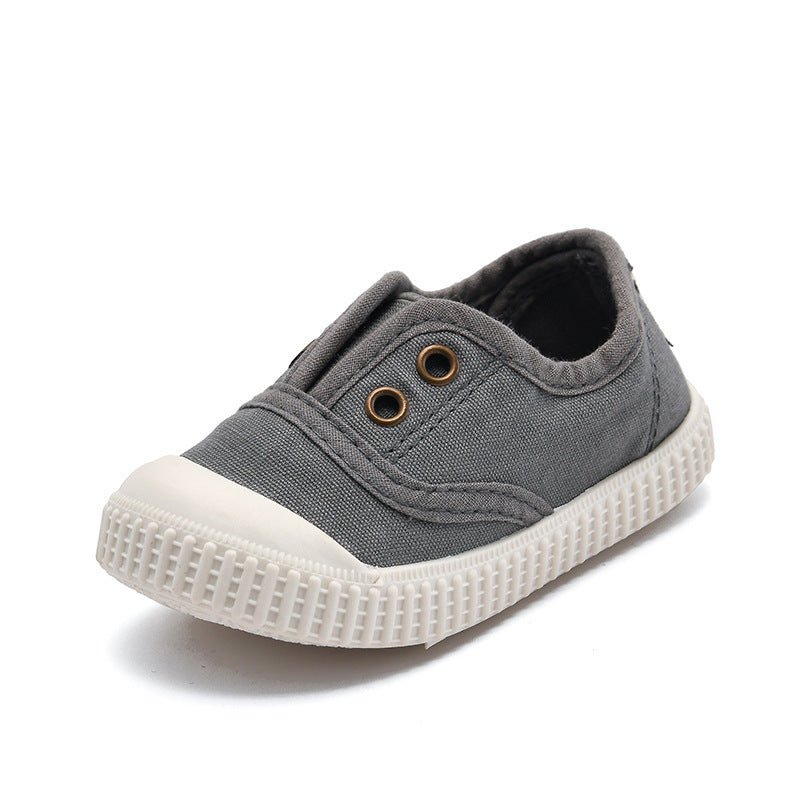 Gray casual shoe with white sole on a white background