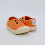 Orange children's shoes with a visible brand label on a white background